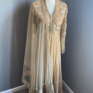 Gold anarkali with pajami and dupatta